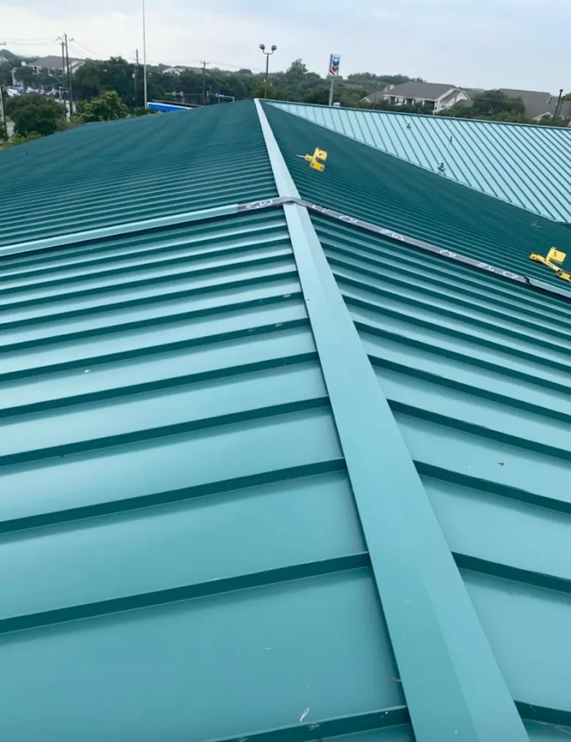 Green commercial metal roof ridge and valley for Metal Roof Repair in Mills River