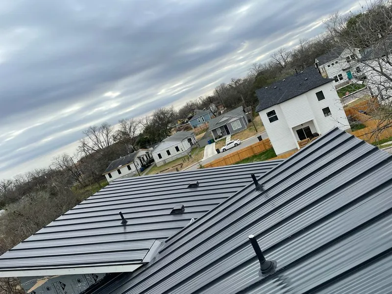 Standing seam metal roof panels with vents for Skylight Repair in Mills River
